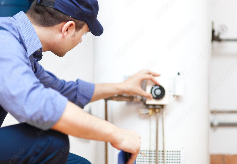 emergency plumbers in york checking water heater